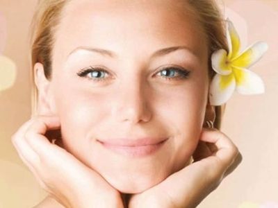 middle aged man bending over in pain and holding his back looking for a natural pain relief cream